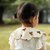 Babero infantil con forma de pétalo de Benzdeer, toalla de saliva, oso beige
