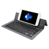 F18 Teclado inalámbrico Bluetooth ultradelgado, recargable, plegable, de 58 teclas, con soporte (gris)