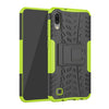 Estuche con patrón de neumáticos PC + TPU a prueba de golpes para Galaxy M10, con soporte (verde)