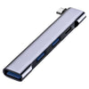 Hub externo expandible/divisor 4 en 1 con conector tipo C, 2 puertos USB 2.0, PD y USB 3.0, con diseño de curvatura lateral.