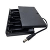 Portapilas para 8 pilas AA con tapa e interruptor de encendido/apagado. Carcasa plana para pilas de 12 V con conector macho de CC de 5,5 mm x 2,1 mm (negro).