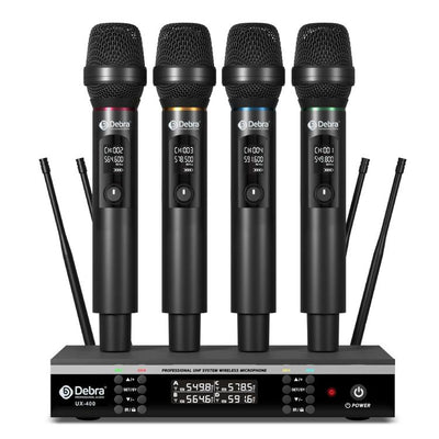 Cuatro micrófonos inalámbricos DEBRA UX-400 sobre su receptor