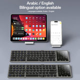 Teclado tri-plegable Yesido KB49 junto a una tablet y un celular